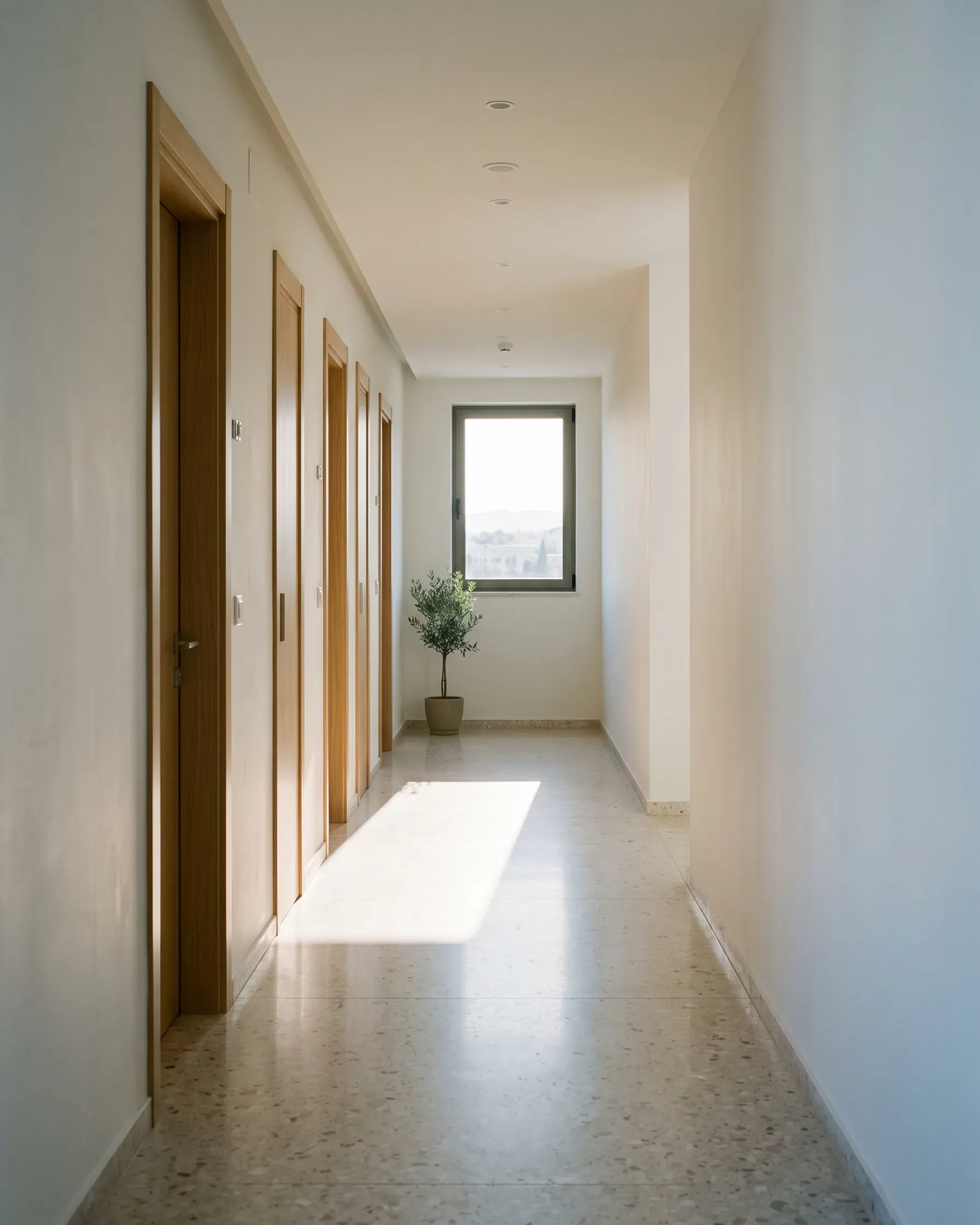 A clean corridor inside an apartment building