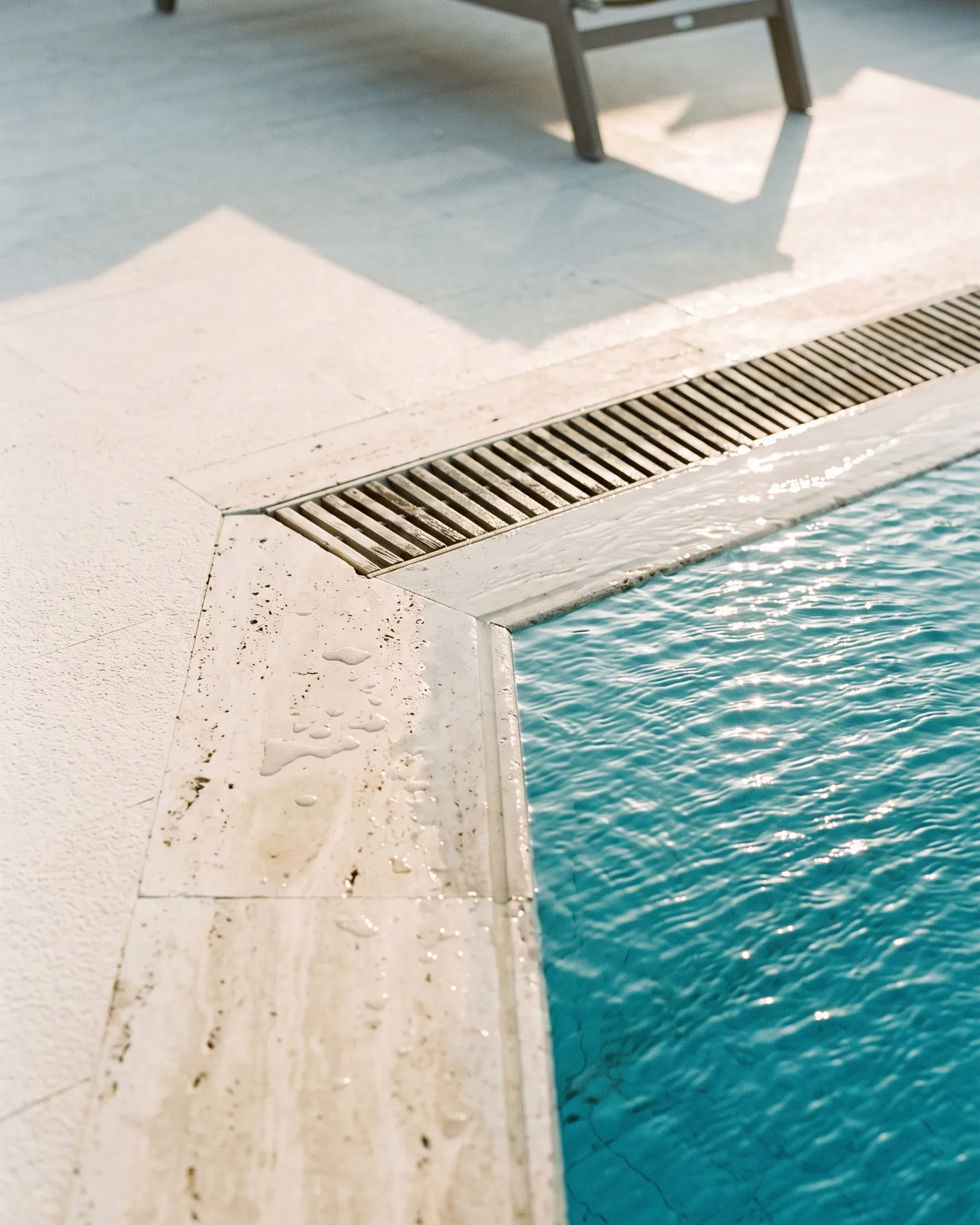 The edge of a pool, early morning